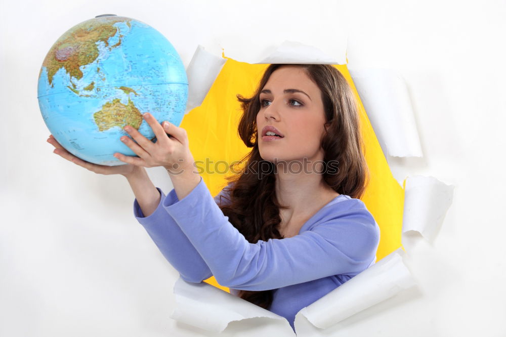 Similar – Girl sitting by the map in classroom