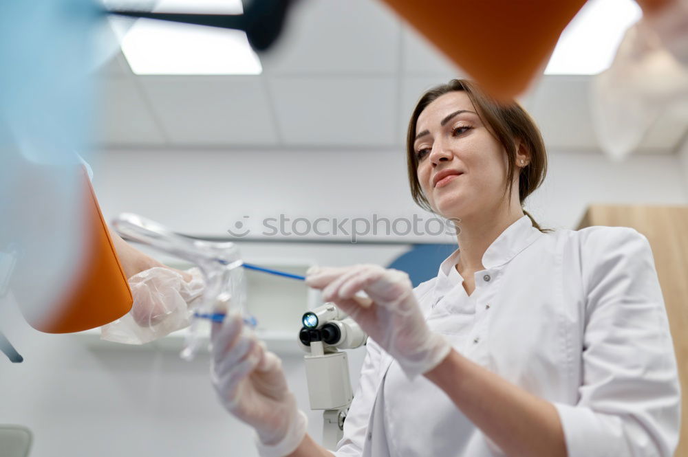 Similar – Image, Stock Photo Hands holding plastic test tube