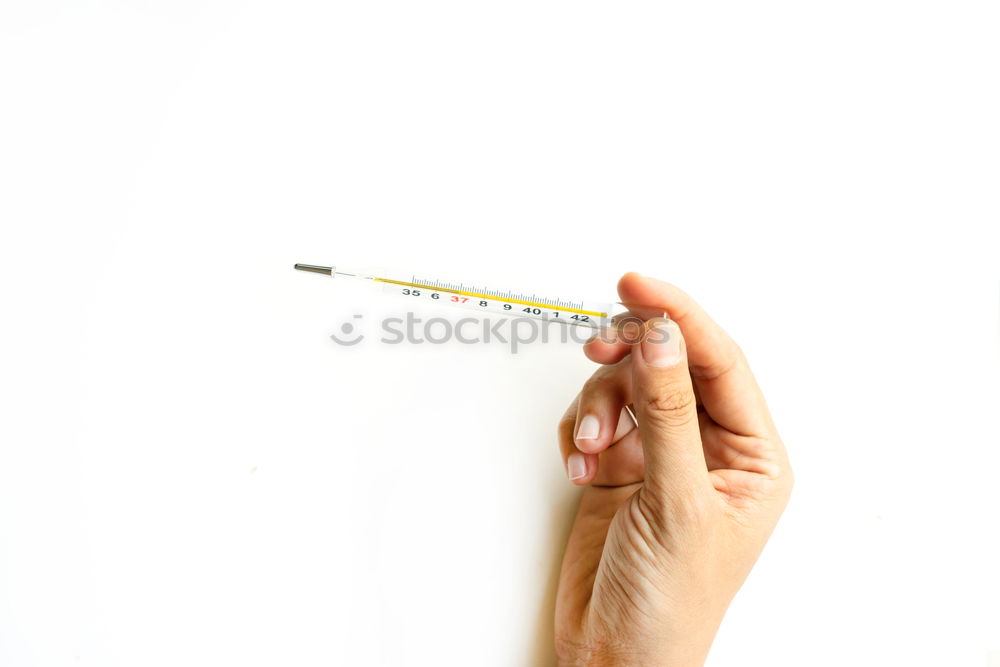 Similar – Medical thermometer 39 close up on colorful pink blurry background