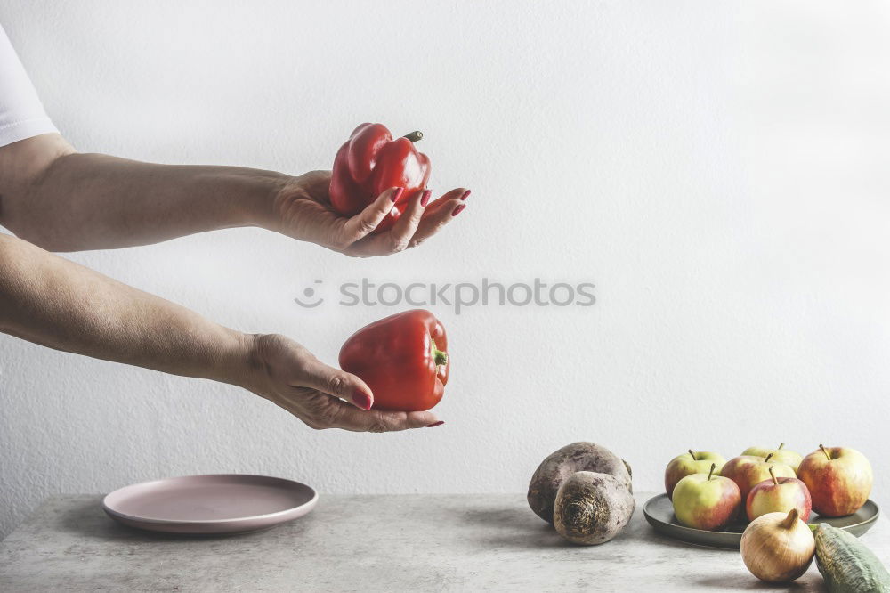 Similar – process of slicing carrots on slices on a kitchen board