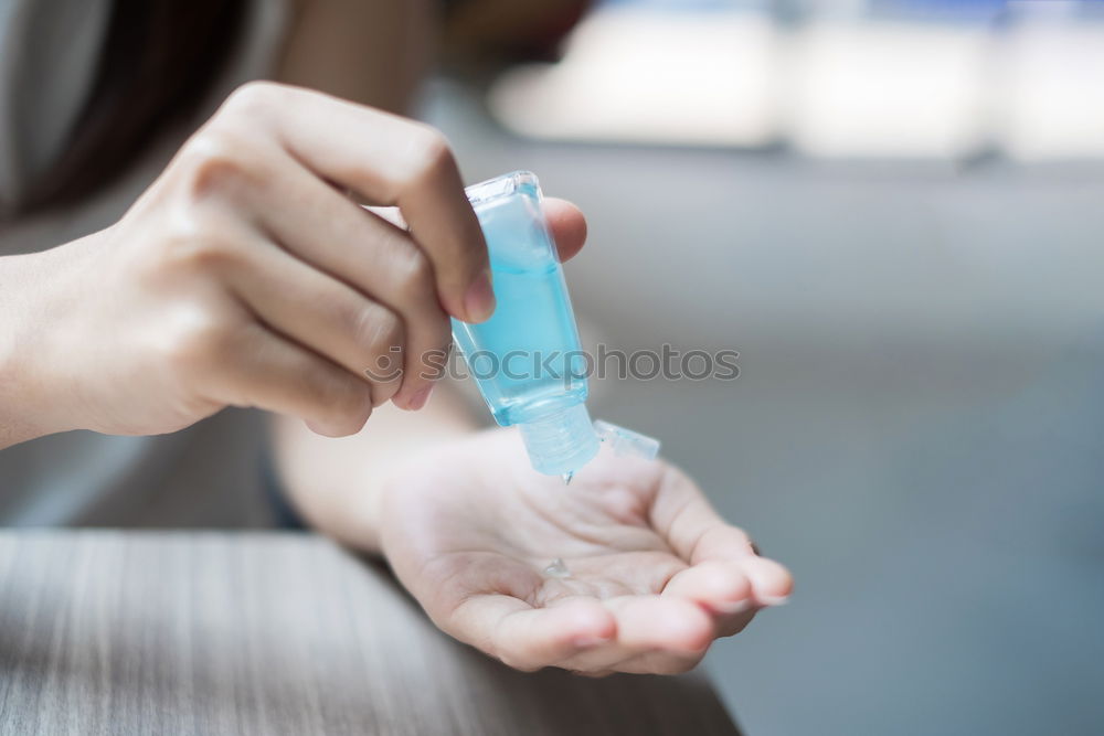 Similar – Female hand with red painted fingernails holding a bottle of red nail polish