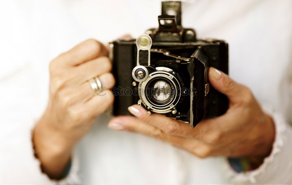 Similar – Image, Stock Photo When he found the box with the old black and white photos, he sank for minutes into holiday memories of his own childhood