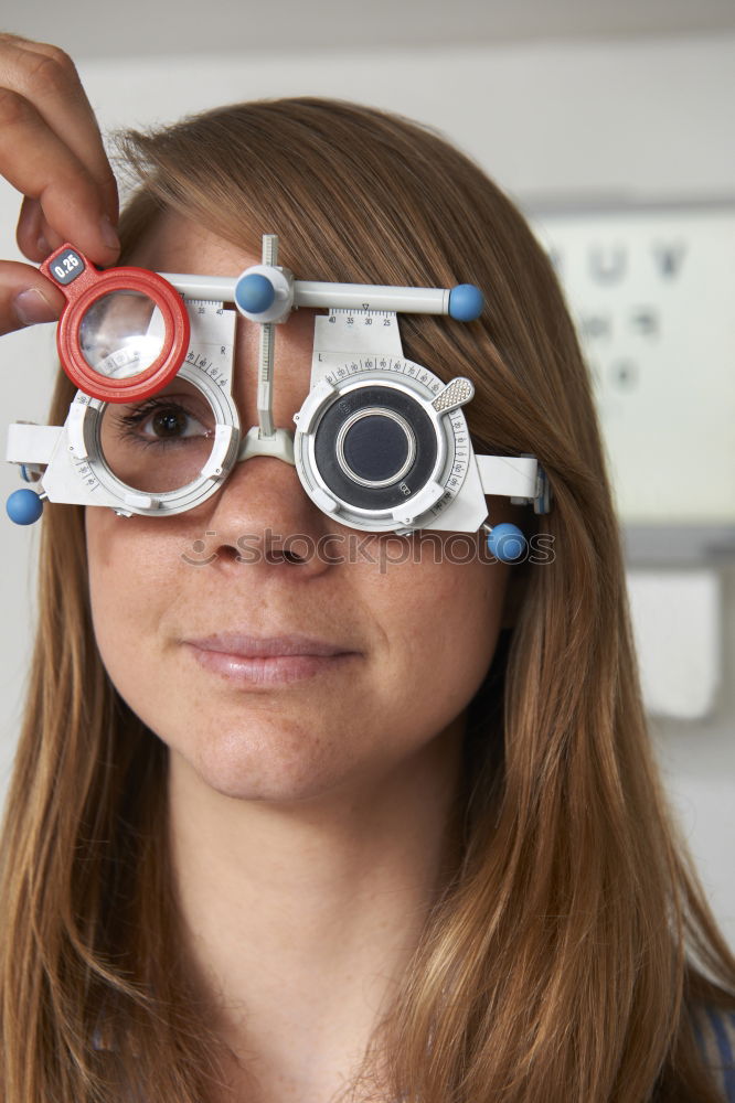 Similar – woman covering her eye with piece of sushi