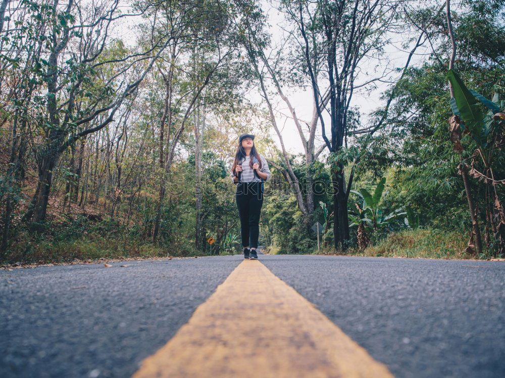 Similar – Image, Stock Photo Woman walking on rod in woods