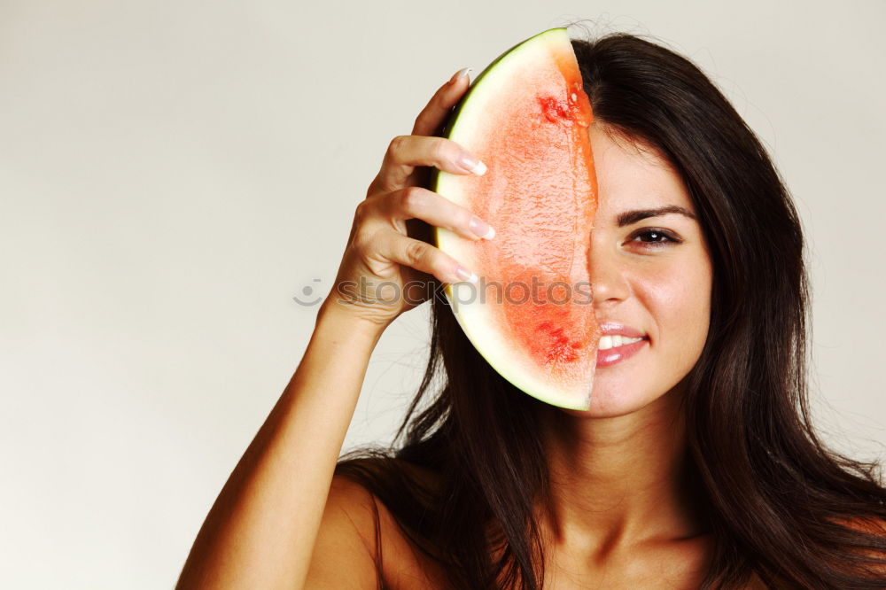 Similar – Image, Stock Photo Young woman eating watermelon popsical