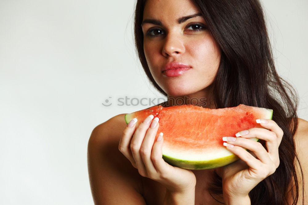 Similar – Image, Stock Photo Young woman eating watermelon popsical