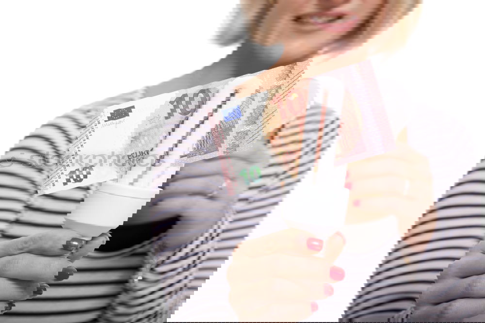 Similar – Image, Stock Photo Payday | hands of a young woman and many banknotes standing on the table before her.