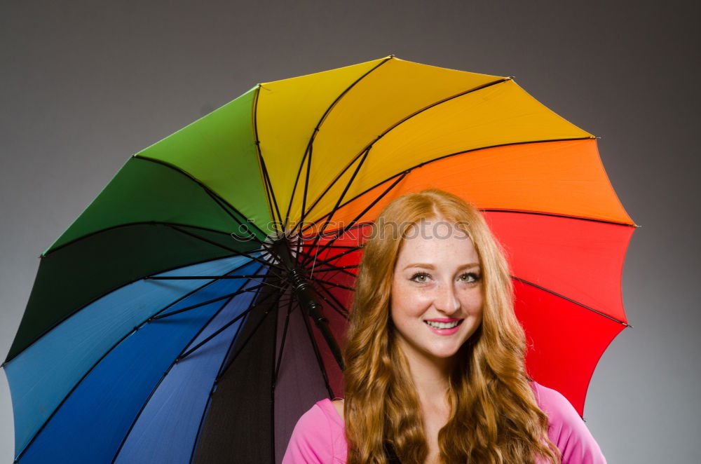 Similar – Image, Stock Photo young woman leans happily against a colourful wooden wall