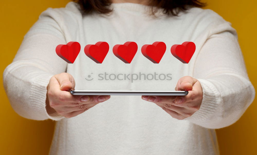 Similar – Closeup of woman’s hands using a smartphone