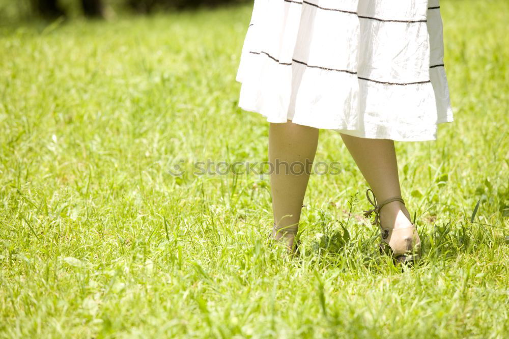 Similar – Image, Stock Photo Girl in rain boots with flowers outdoor