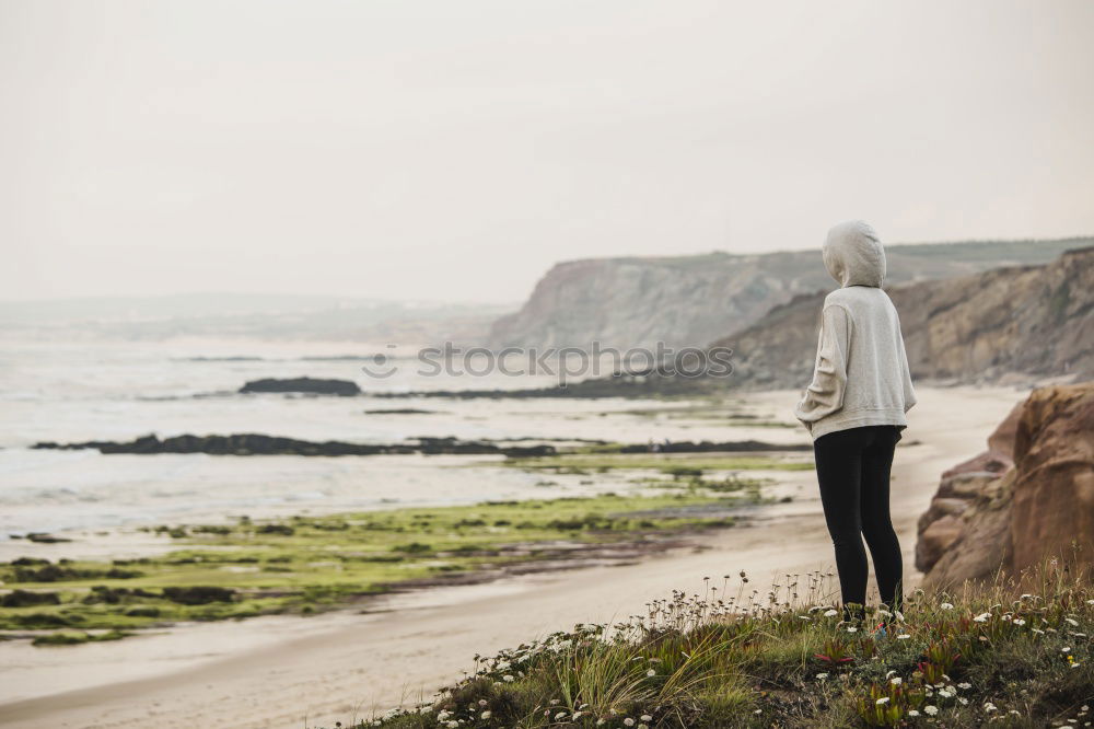 Similar – Woman standing on white cliffs by sea in England