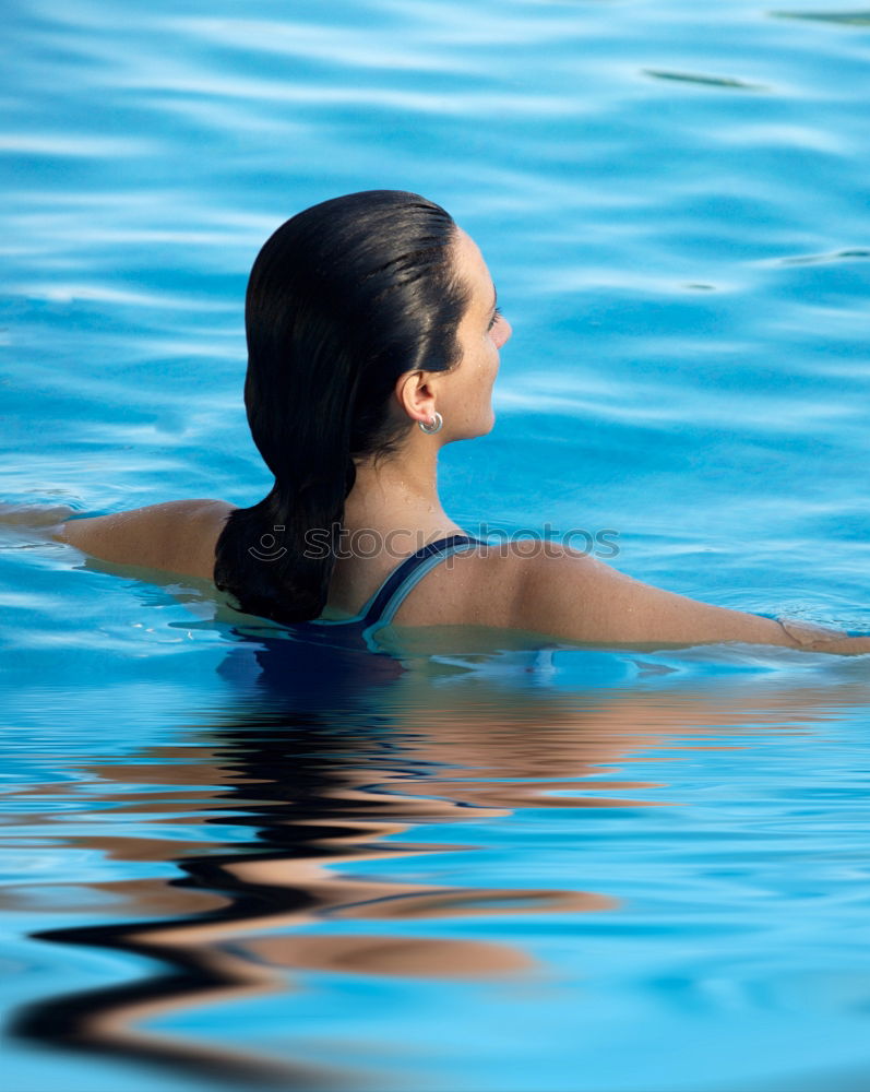 Similar – Girl with dress in pool