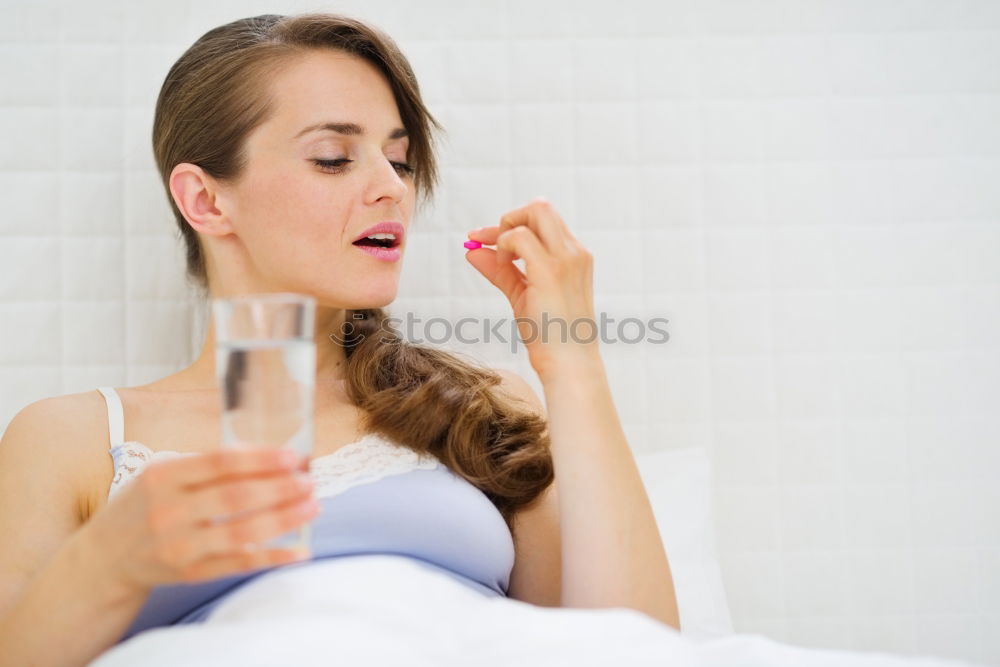 Similar – Young female adult brushing teeth in the morning