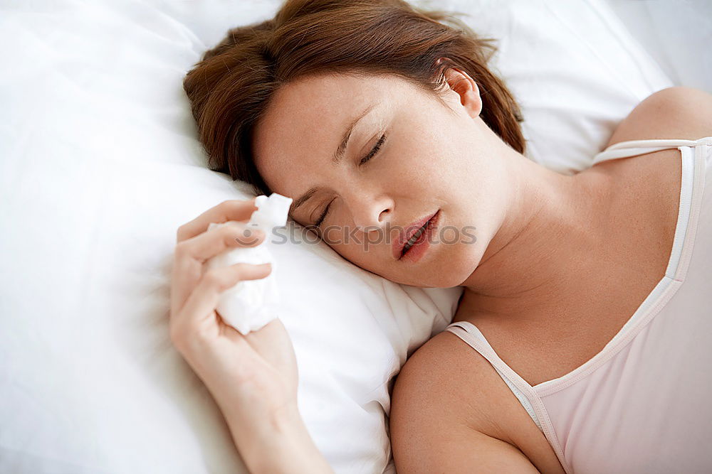 Similar – Portrait of a beautiful adult woman lying on a bed