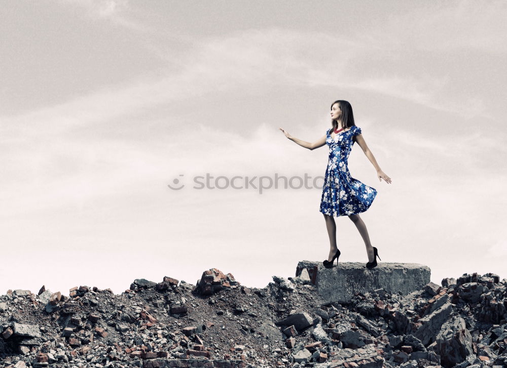 Similar – Young Lady standing on a roof