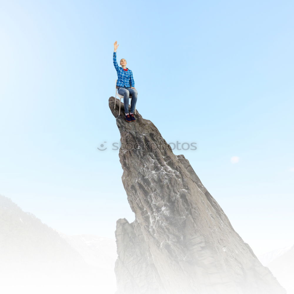 Similar – Climber reaching for a helping-hand.