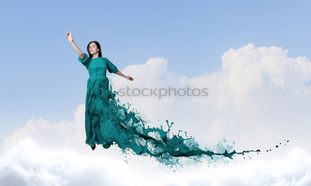 Similar – woman among the clouds