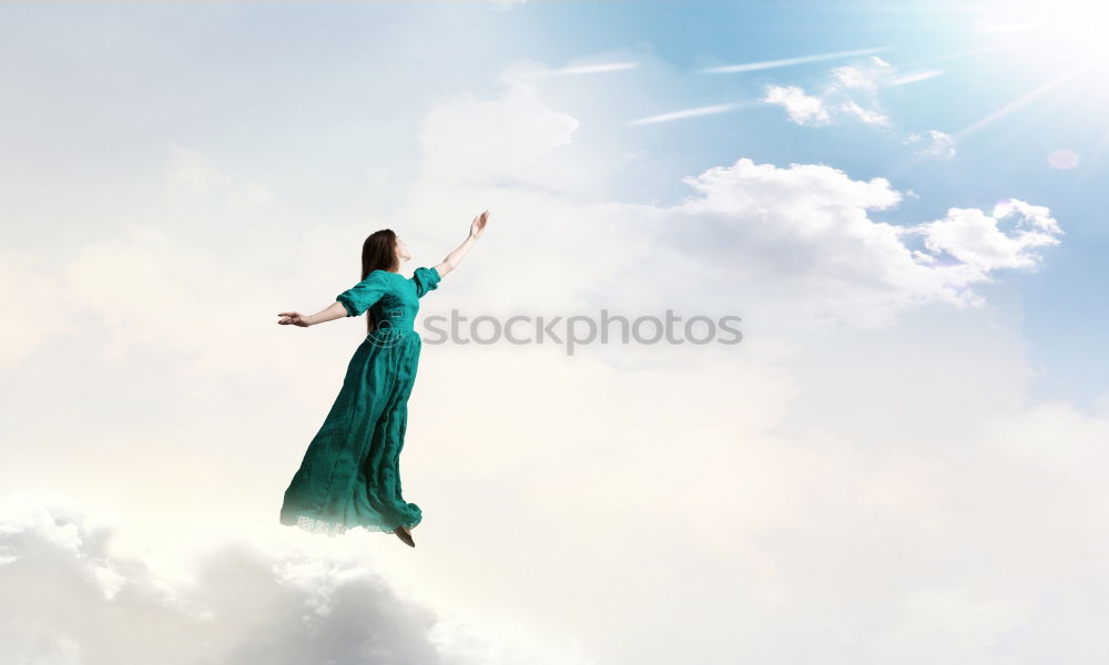 Similar – woman dreaming of the clouds