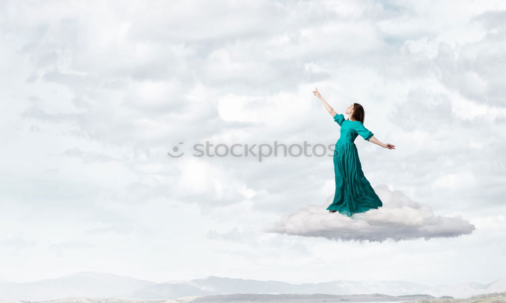 Similar – woman dreaming of the clouds