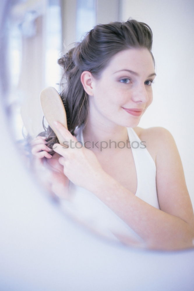 Similar – Happpy Young caucasian women brushing her teeth