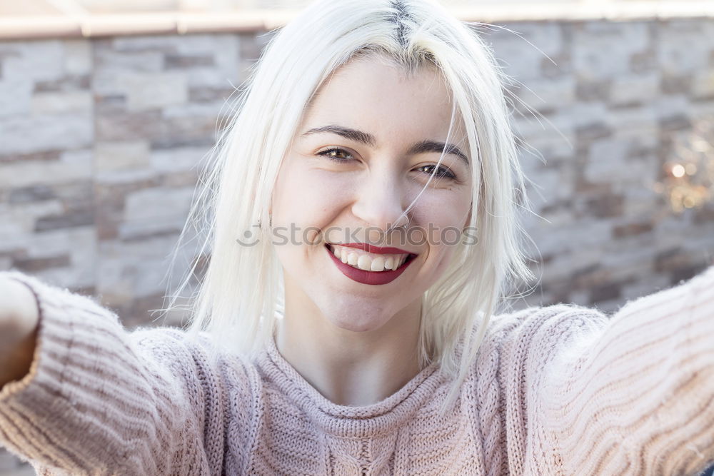 Blonde woman with nose piercing