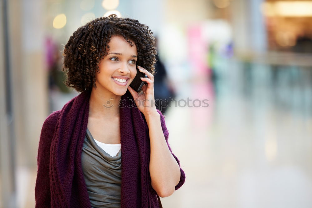 Similar – Image, Stock Photo Portrait of a cheerful young african woman standing outdoors