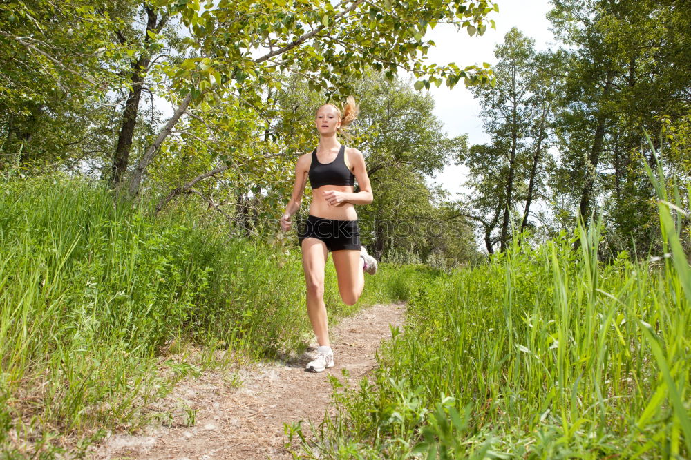 Similar – Image, Stock Photo athletic woman running outdoors