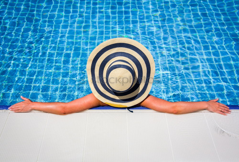 Similar – Image, Stock Photo Woman relaxing on inflatable ring in swimming pool