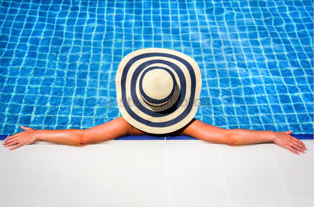 Similar – Image, Stock Photo Woman relaxing on inflatable ring in swimming pool