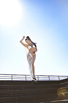 Similar – Image, Stock Photo Pretty women sitting on roof