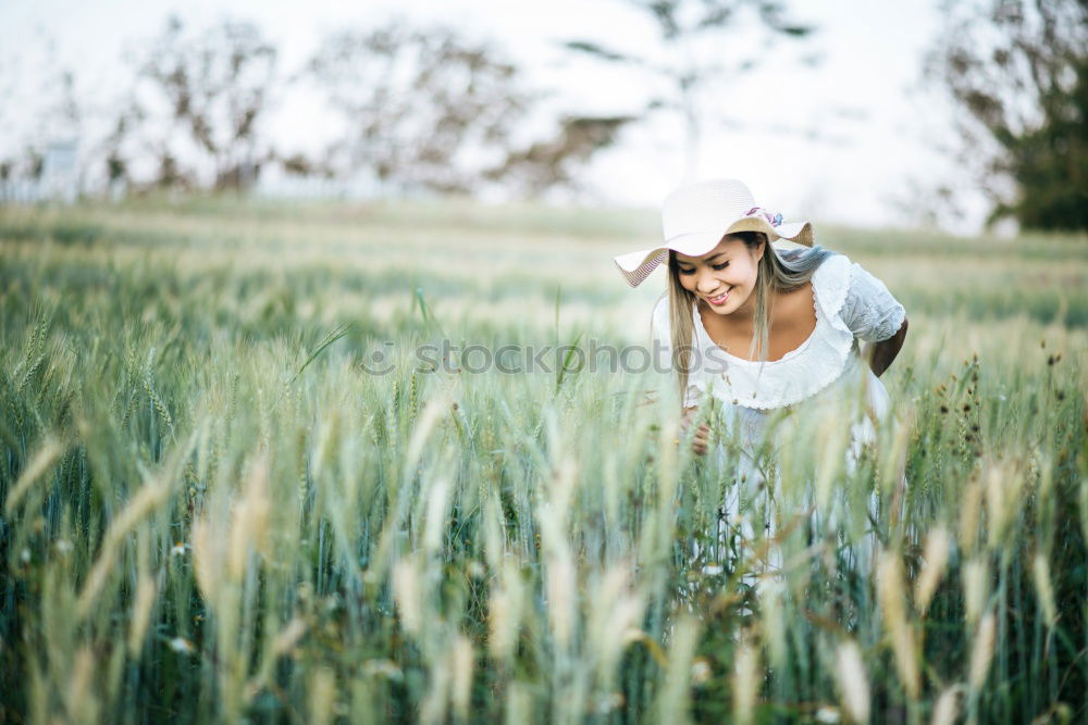 Similar – Image, Stock Photo Young woman walking in a path in the middle of a vineyard