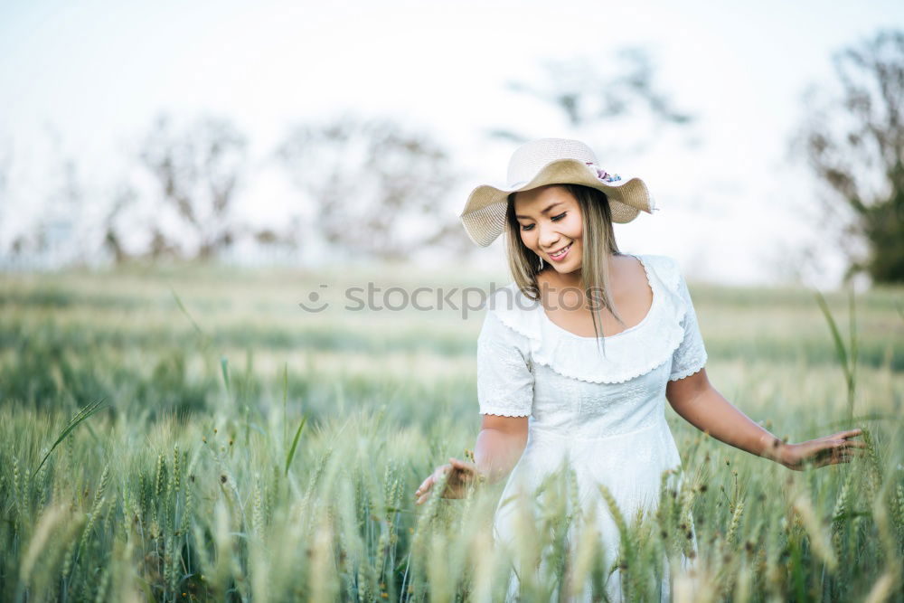 Similar – Image, Stock Photo Young woman walking in a path in the middle of a vineyard