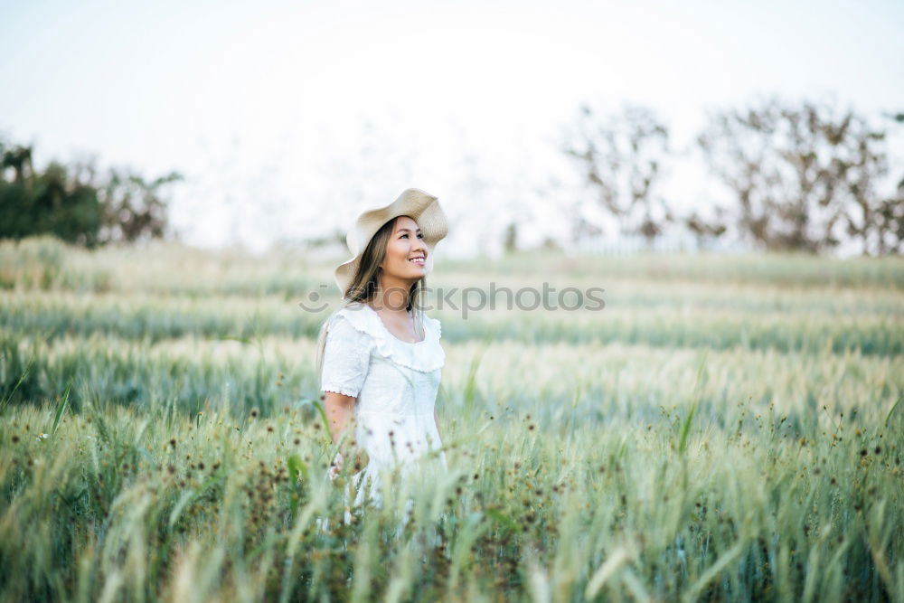 Similar – Woman in a green cornfield