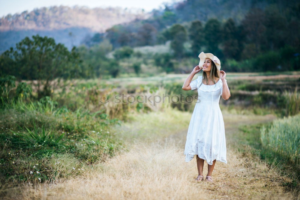 Similar – Girl picking berries in backyard