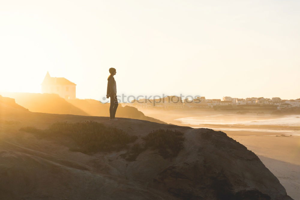 Similar – Image, Stock Photo Person on cliff on seashore