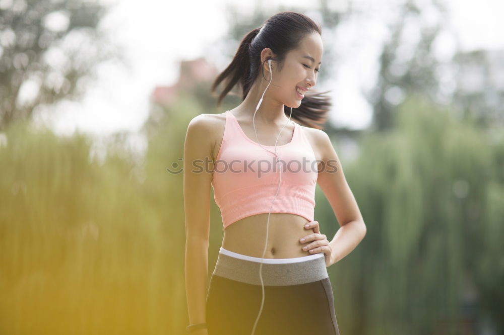 Similar – athletic woman eating an apple