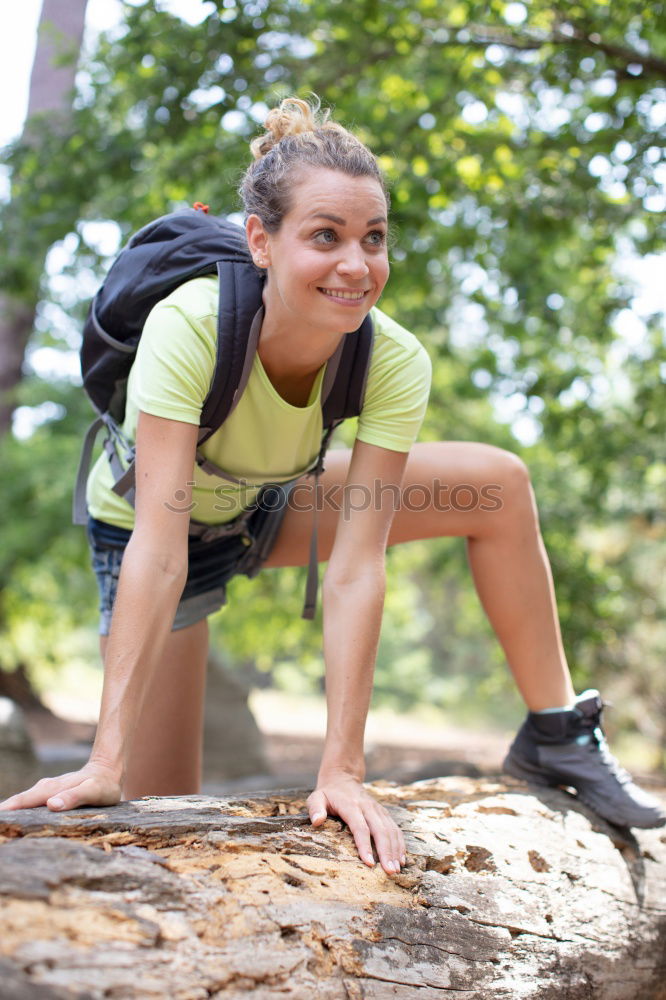 Similar – Image, Stock Photo blonde woman sitting in the grass and stretching in a park