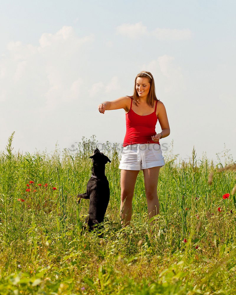 Similar – Image, Stock Photo Young woman with small dog at the lake