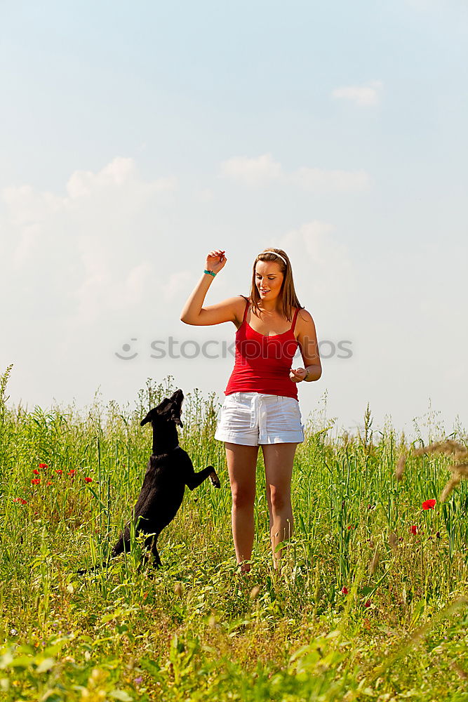 Similar – Image, Stock Photo Young woman with small dog at the lake