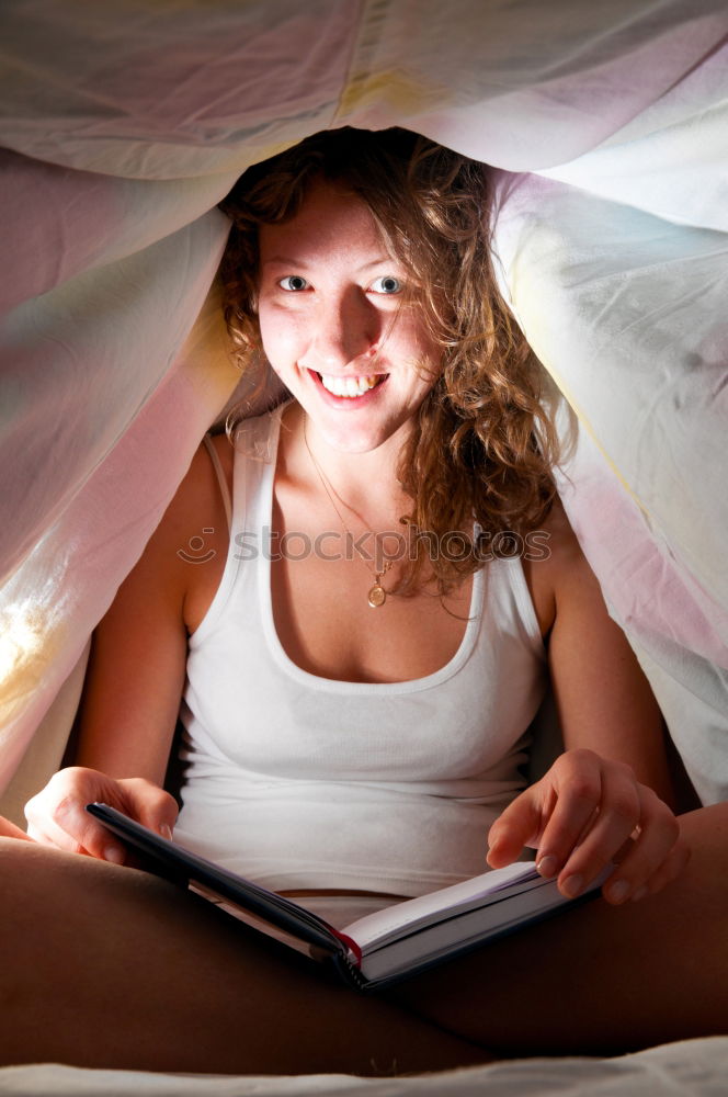 Similar – Image, Stock Photo Girl watching movie online on smartphone sitting on bed at home