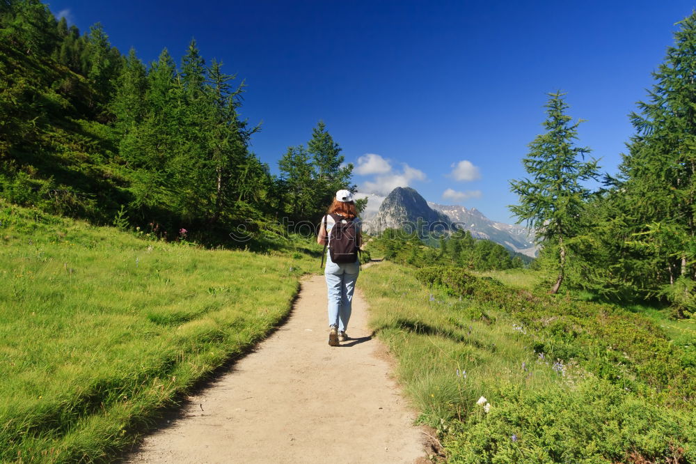 Similar – Image, Stock Photo Women walking on rural road