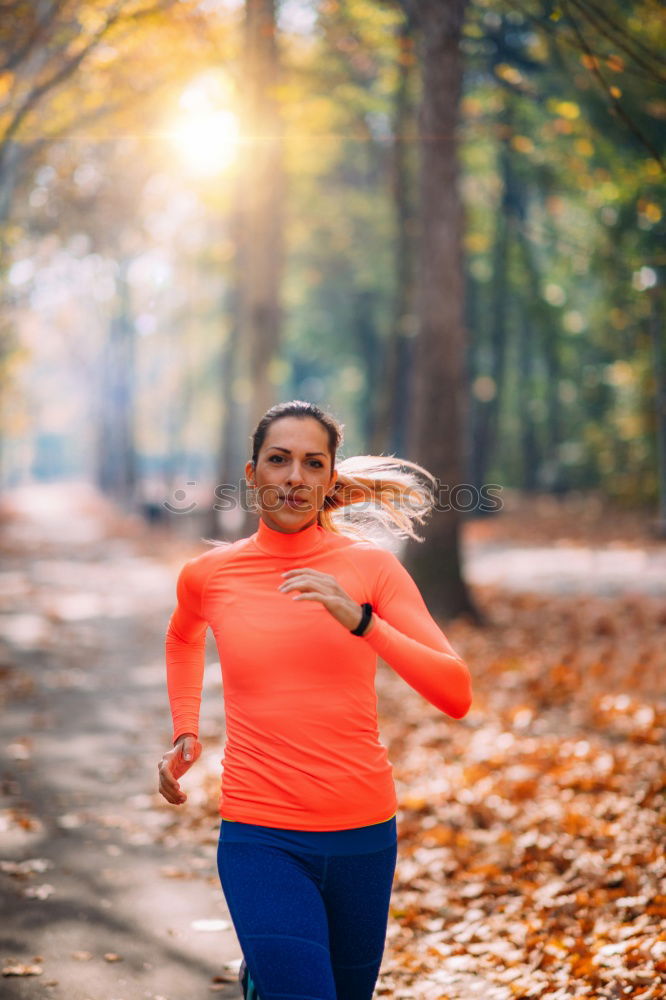 Similar – Image, Stock Photo Pretty fit young woman jogging in woodland