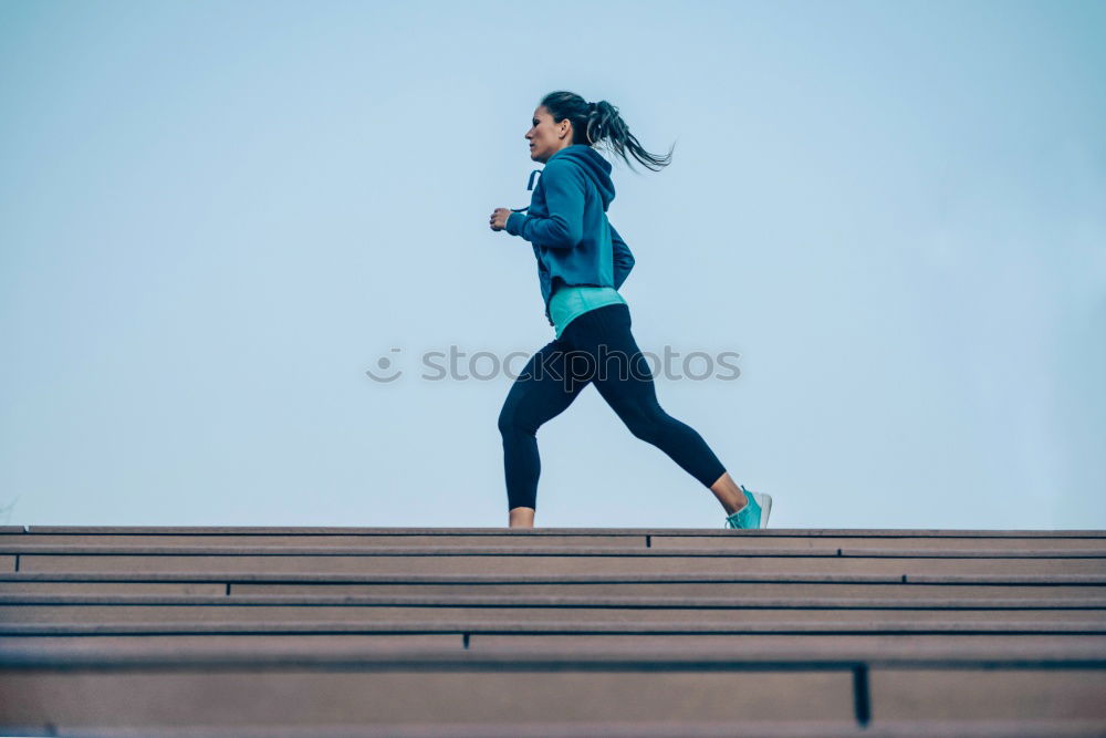 Similar – Image, Stock Photo Young fitness woman runner stretching legs after run.