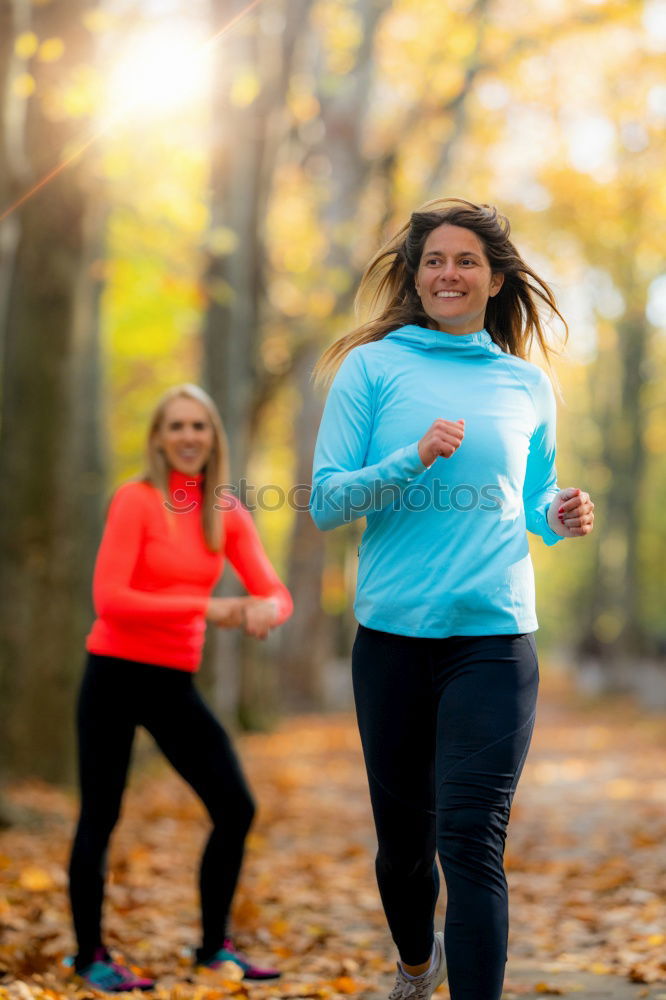 Similar – Athletic Woman in Running Exercise at the Park