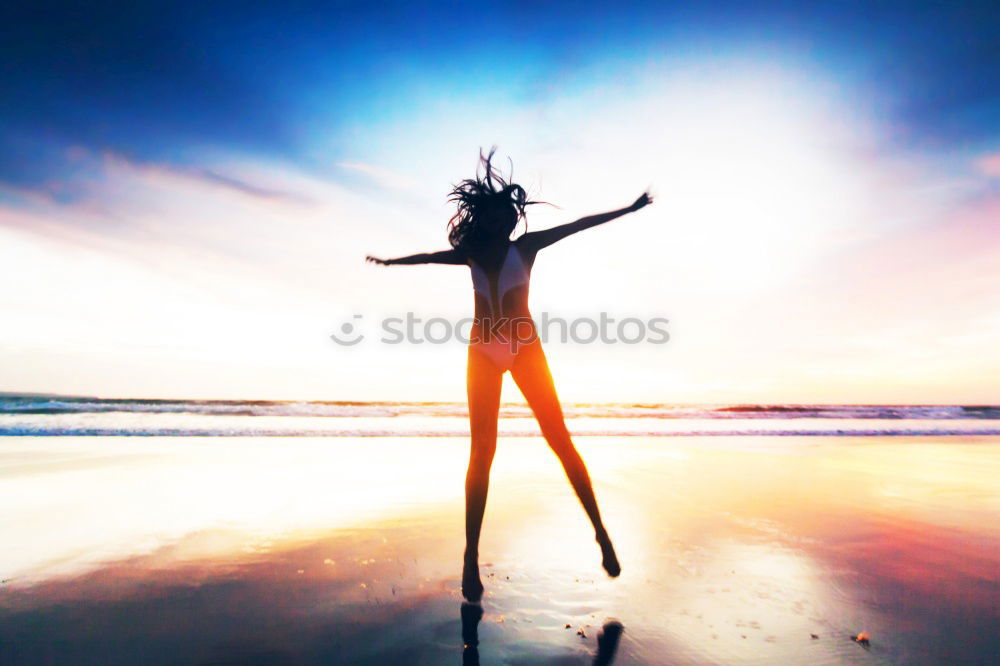 Similar – Little girl feeling free on the beach