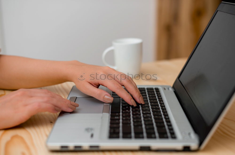 Similar – Woman measuring her own blood pressure at home.