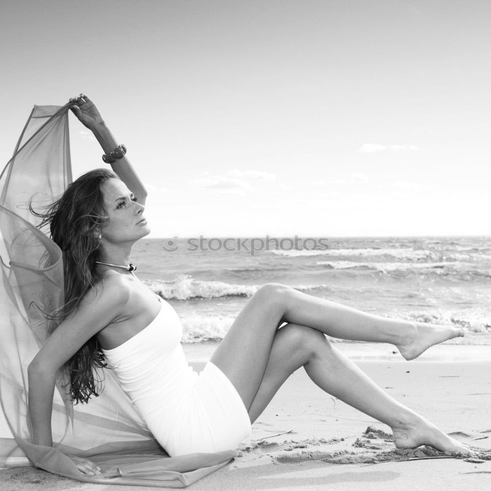 Similar – Image, Stock Photo Young adult couple kissing on beach after running workout