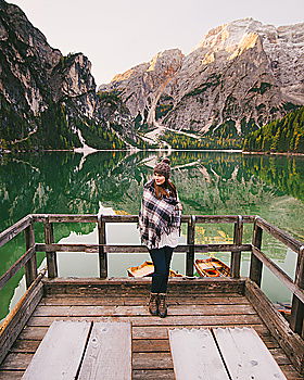 Similar – Women at lake in mountains