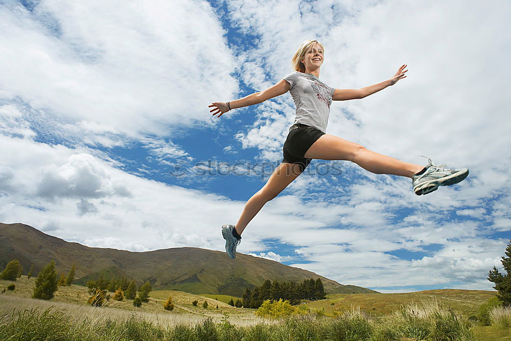 Similar – Woman jogging in countryside