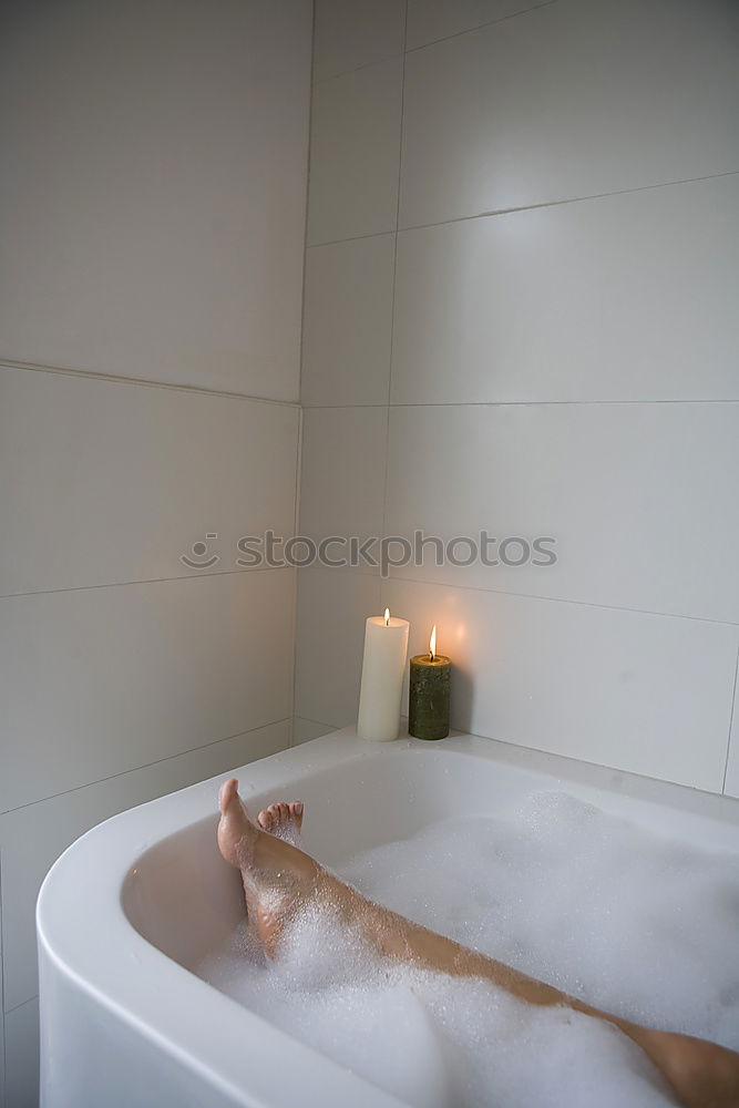 Similar – Woman lying in tub doing hydrotherapy treatment